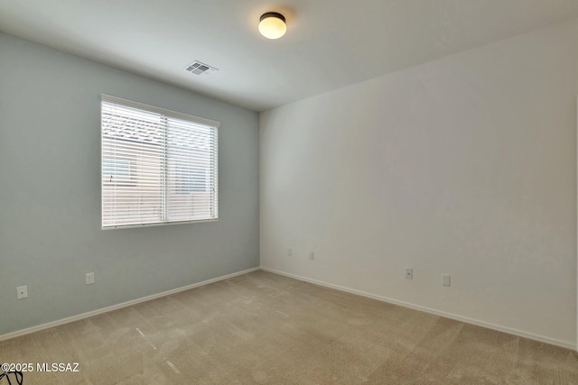 12171 N Golden Mirror Dr, Marana, AZ 85658 - empty room with light colored carpet and baseboards