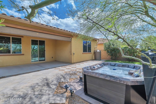 12171 N Golden Mirror Dr, Marana, AZ 85658 - view of patio / terrace featuring a hot tub