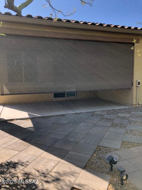 garage with fence