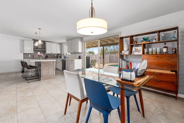 dining room featuring light tile patterned flooring