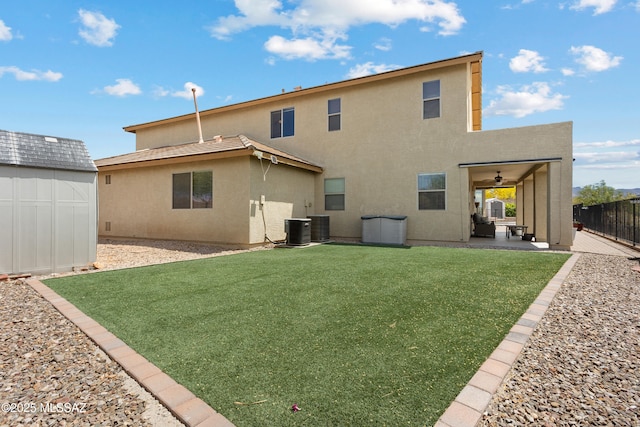 761 W Grantham St, Vail, AZ 85641 - rear view of house featuring a shed, stucco siding, an outdoor structure, and a patio