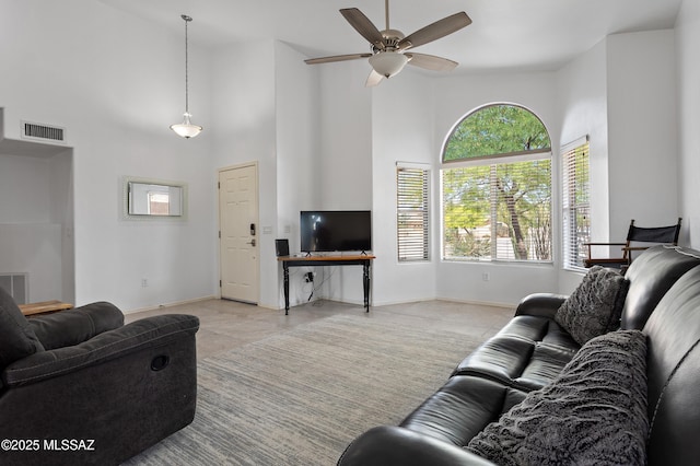 761 W Grantham St, Vail, AZ 85641 - living room featuring ceiling fan, a wealth of natural light, baseboards, and visible vents