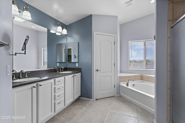 761 W Grantham St, Vail, AZ 85641 - bathroom with lofted ceiling, tile patterned flooring, visible vents, and a sink
