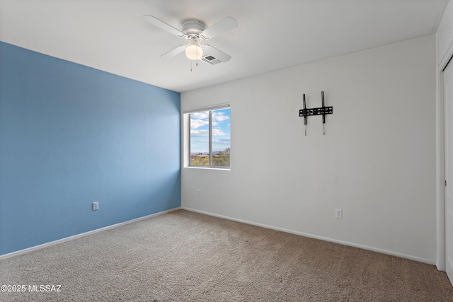 761 W Grantham St, Vail, AZ 85641 - carpeted spare room with baseboards, a ceiling fan, and visible vents
