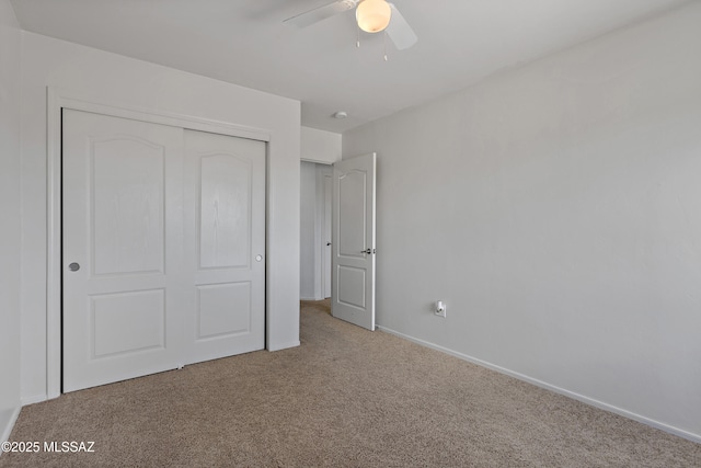 761 W Grantham St, Vail, AZ 85641 - unfurnished bedroom featuring carpet, a closet, baseboards, and a ceiling fan