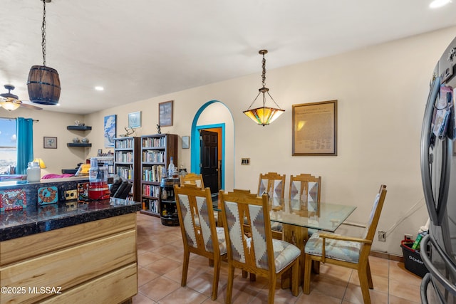 dining room with recessed lighting, a ceiling fan, and light tile patterned flooring
