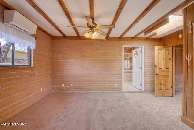 spare room featuring brick wall, an AC wall unit, ceiling fan, carpet floors, and beamed ceiling