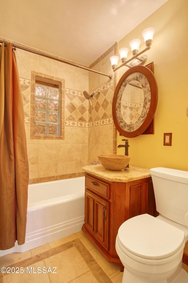 bathroom with toilet, shower / tub combo with curtain, and vanity