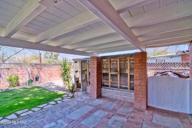 view of patio with fence