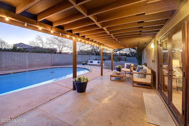 view of pool with a fenced in pool, a patio, an outdoor living space, and a fenced backyard