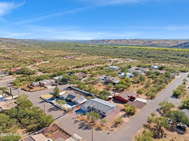 bird's eye view with a mountain view