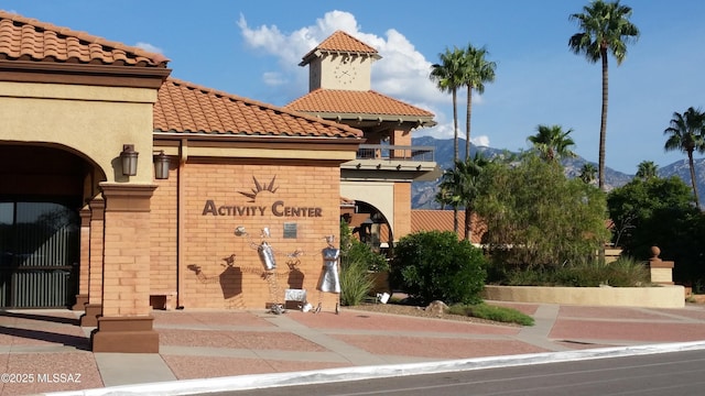 view of building exterior with a mountain view