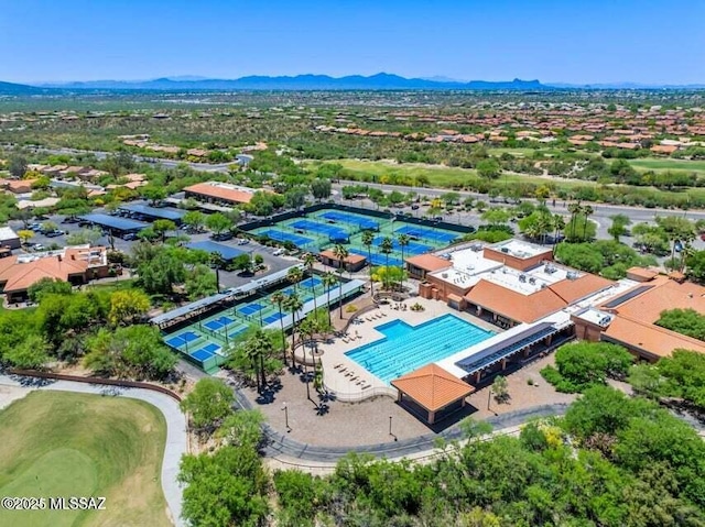 birds eye view of property featuring a mountain view