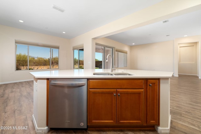 13906 N Rim Trl, Marana, AZ 85658 - kitchen featuring stainless steel dishwasher, a sink, open floor plan, light countertops, and recessed lighting