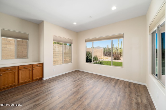 13906 N Rim Trl, Marana, AZ 85658 - spare room featuring dark wood-type flooring, baseboards, and recessed lighting