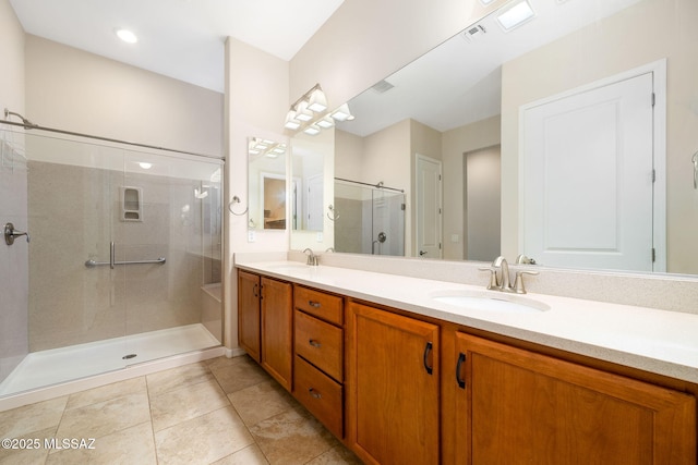 13906 N Rim Trl, Marana, AZ 85658 - bathroom featuring a stall shower, double vanity, and tile patterned flooring