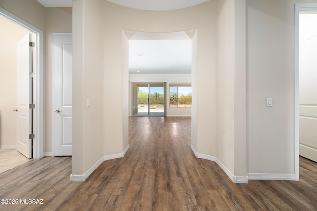 13906 N Rim Trl, Marana, AZ 85658 - hallway featuring wood finished floors and baseboards