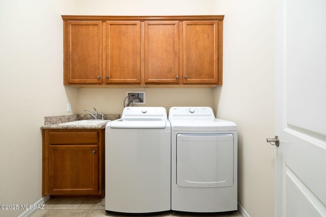 13906 N Rim Trl, Marana, AZ 85658 - washroom with cabinet space, washing machine and dryer, and baseboards
