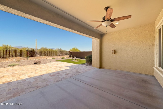 13906 N Rim Trl, Marana, AZ 85658 - view of patio with a ceiling fan and a fenced backyard
