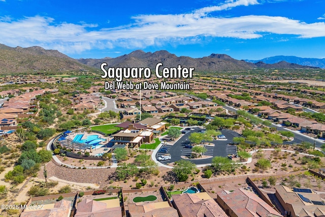 13906 N Rim Trl, Marana, AZ 85658 - aerial perspective of suburban area with a mountainous background and a pool area