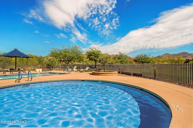 13906 N Rim Trl, Marana, AZ 85658 - community pool with fence and a patio area