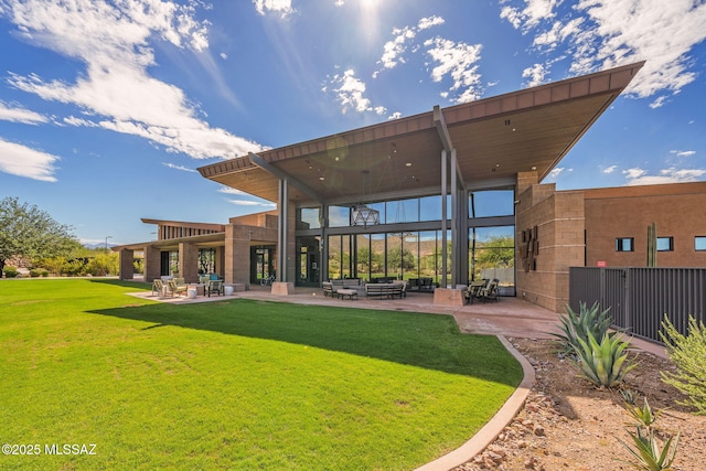 13906 N Rim Trl, Marana, AZ 85658 - rear view of house featuring a patio area and a yard