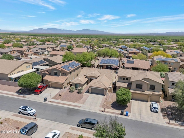 aerial view with a mountain view and a residential view