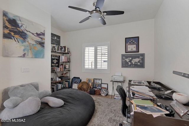 office space with a ceiling fan