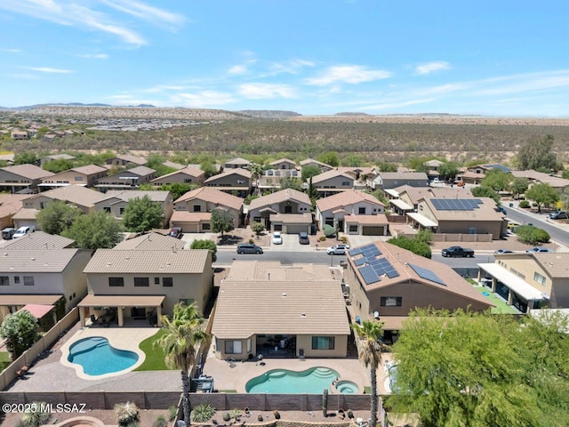 aerial view with a mountain view and a residential view