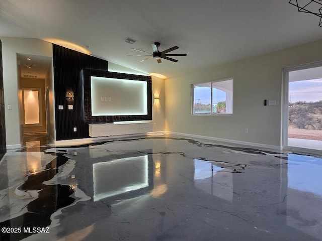 cinema featuring baseboards, a ceiling fan, visible vents, lofted ceiling, and marble finish floor