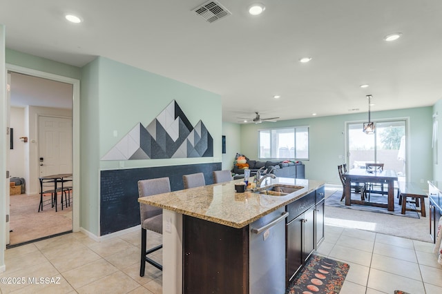 3295 W Sunlit Peak Dr, Tucson, AZ 85742 - kitchen featuring recessed lighting, light tile patterned floors, visible vents, dishwasher, and a sink