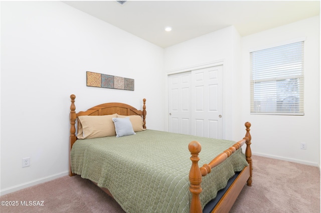 3295 W Sunlit Peak Dr, Tucson, AZ 85742 - bedroom featuring a closet, carpet flooring, baseboards, and recessed lighting
