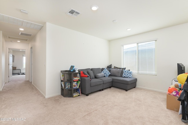 3295 W Sunlit Peak Dr, Tucson, AZ 85742 - carpeted living room featuring visible vents, baseboards, and recessed lighting