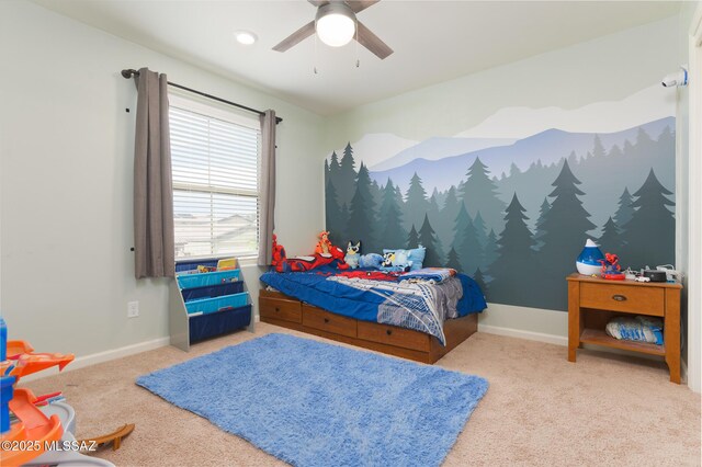 3295 W Sunlit Peak Dr, Tucson, AZ 85742 - bedroom with baseboards, a ceiling fan, and carpet flooring