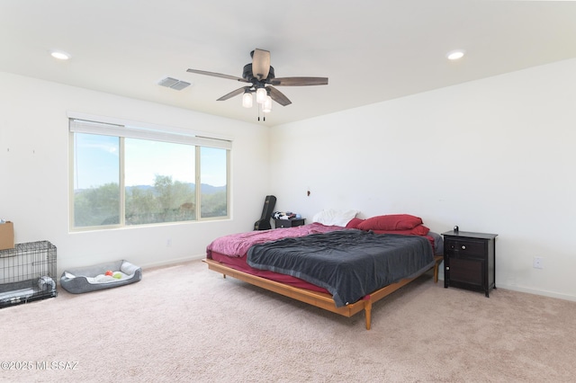 3295 W Sunlit Peak Dr, Tucson, AZ 85742 - bedroom with light colored carpet, baseboards, and visible vents