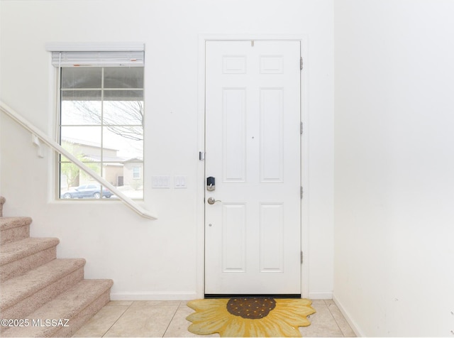 3295 W Sunlit Peak Dr, Tucson, AZ 85742 - tiled entrance foyer with baseboards and stairway