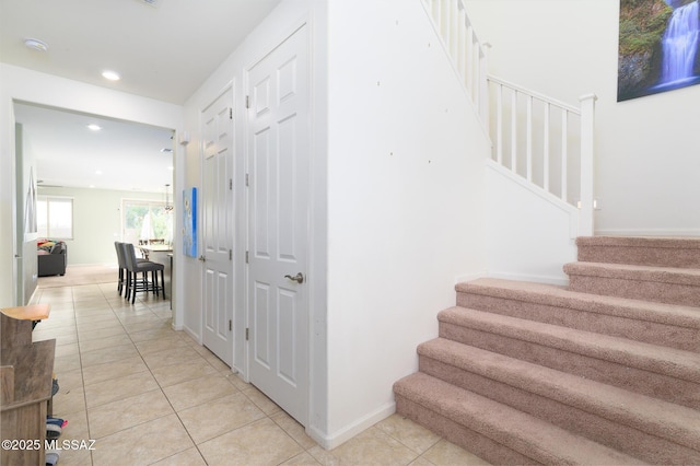 3295 W Sunlit Peak Dr, Tucson, AZ 85742 - stairs featuring baseboards, tile patterned flooring, and recessed lighting