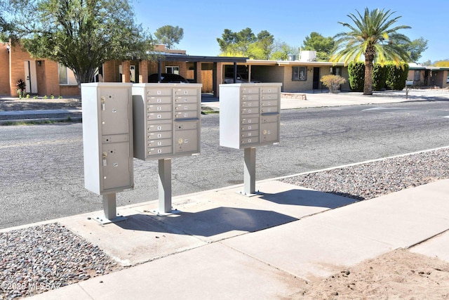 view of home's community featuring mail area
