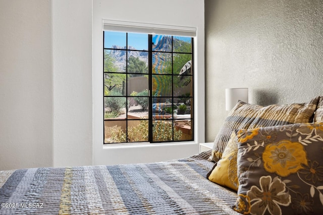 bedroom with a textured wall