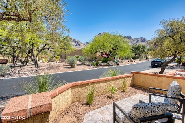 view of patio with a mountain view