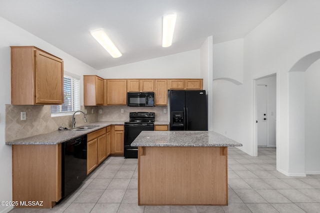 13140 E Mesquite Flat Spring Dr, Vail, AZ 85641 - kitchen with black appliances, a sink, tasteful backsplash, vaulted ceiling, and a center island