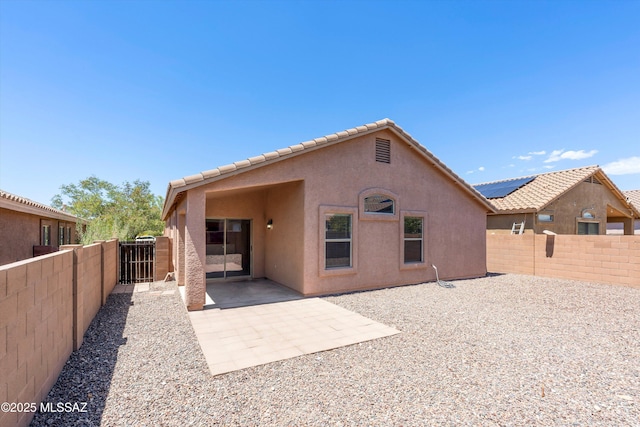 13140 E Mesquite Flat Spring Dr, Vail, AZ 85641 - back of house with a fenced backyard, stucco siding, a tile roof, and a patio area