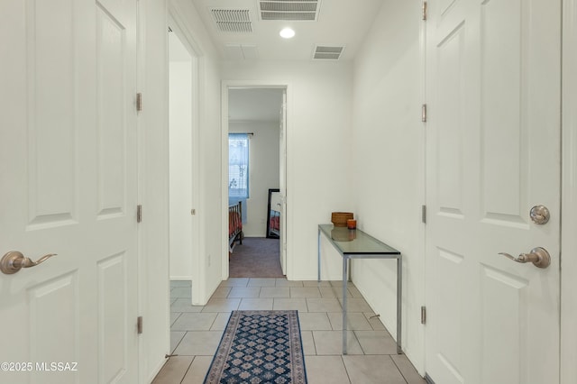6548 E Via Arroyo Largo, Tucson, AZ 85756 - corridor with light tile patterned floors and baseboards
