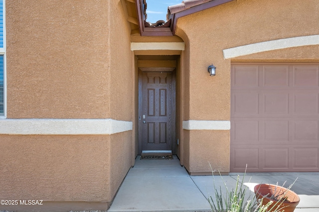 6548 E Via Arroyo Largo, Tucson, AZ 85756 - property entrance with stucco siding