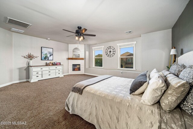 bedroom with carpet flooring, baseboards, and visible vents