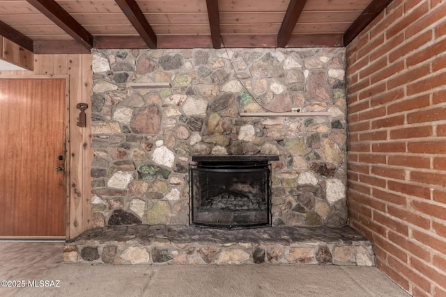 423 E Hadley St, Tucson, AZ 85705 - room details featuring beamed ceiling, a fireplace, and wood ceiling