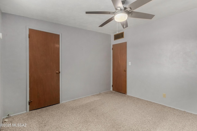 423 E Hadley St, Tucson, AZ 85705 - unfurnished room featuring carpet, visible vents, baseboards, and ceiling fan