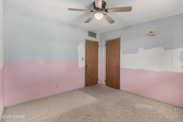 423 E Hadley St, Tucson, AZ 85705 - empty room with a ceiling fan, visible vents, and carpet