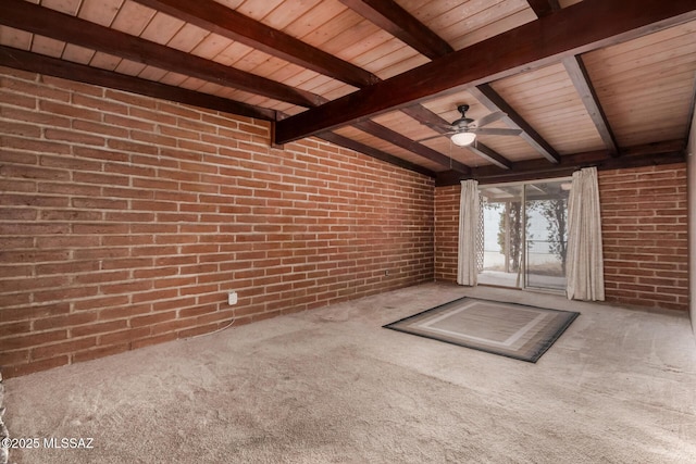 423 E Hadley St, Tucson, AZ 85705 - unfurnished living room featuring lofted ceiling with beams, carpet floors, a ceiling fan, brick wall, and wood ceiling