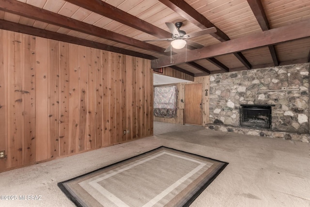 423 E Hadley St, Tucson, AZ 85705 - unfurnished living room featuring carpet, wood ceiling, and beamed ceiling